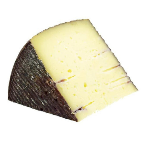 Queso Manchego de oveja al vino tinto(6 meses) porcionado 250g