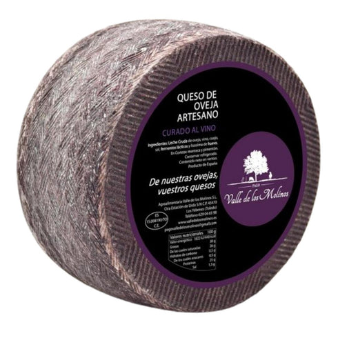Queso Manchego de oveja al vino tinto(6 meses) porcionado 250g